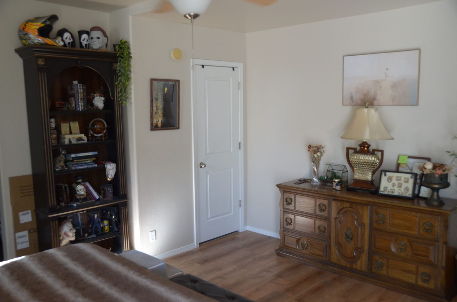 Primary bedroom, dresser and shelving