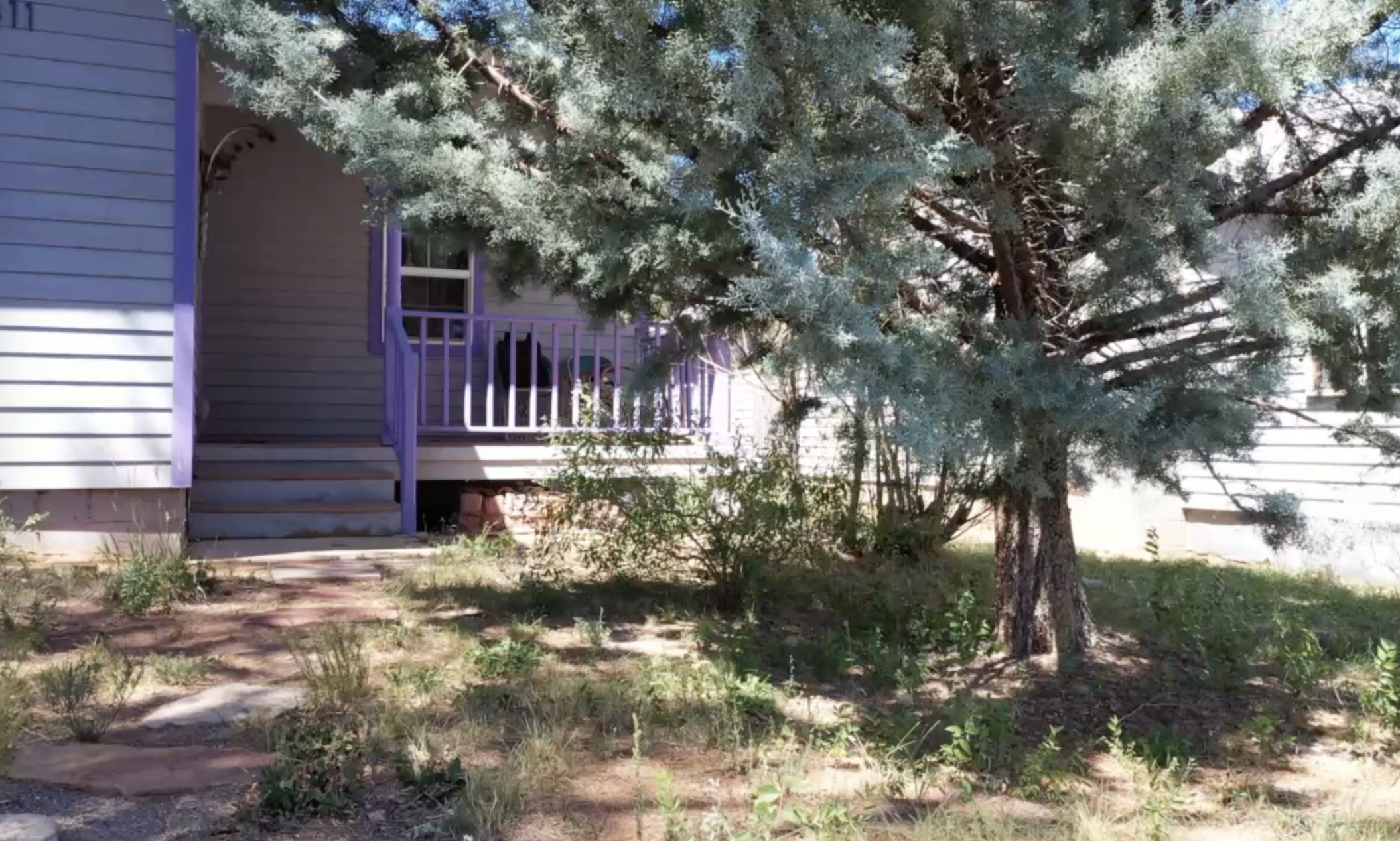 Front exterior of the house with covered porch